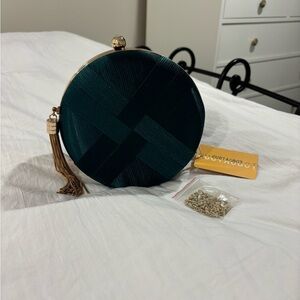 Dark Green Clutch Bag with gold chain included. Never been worn and new with tag